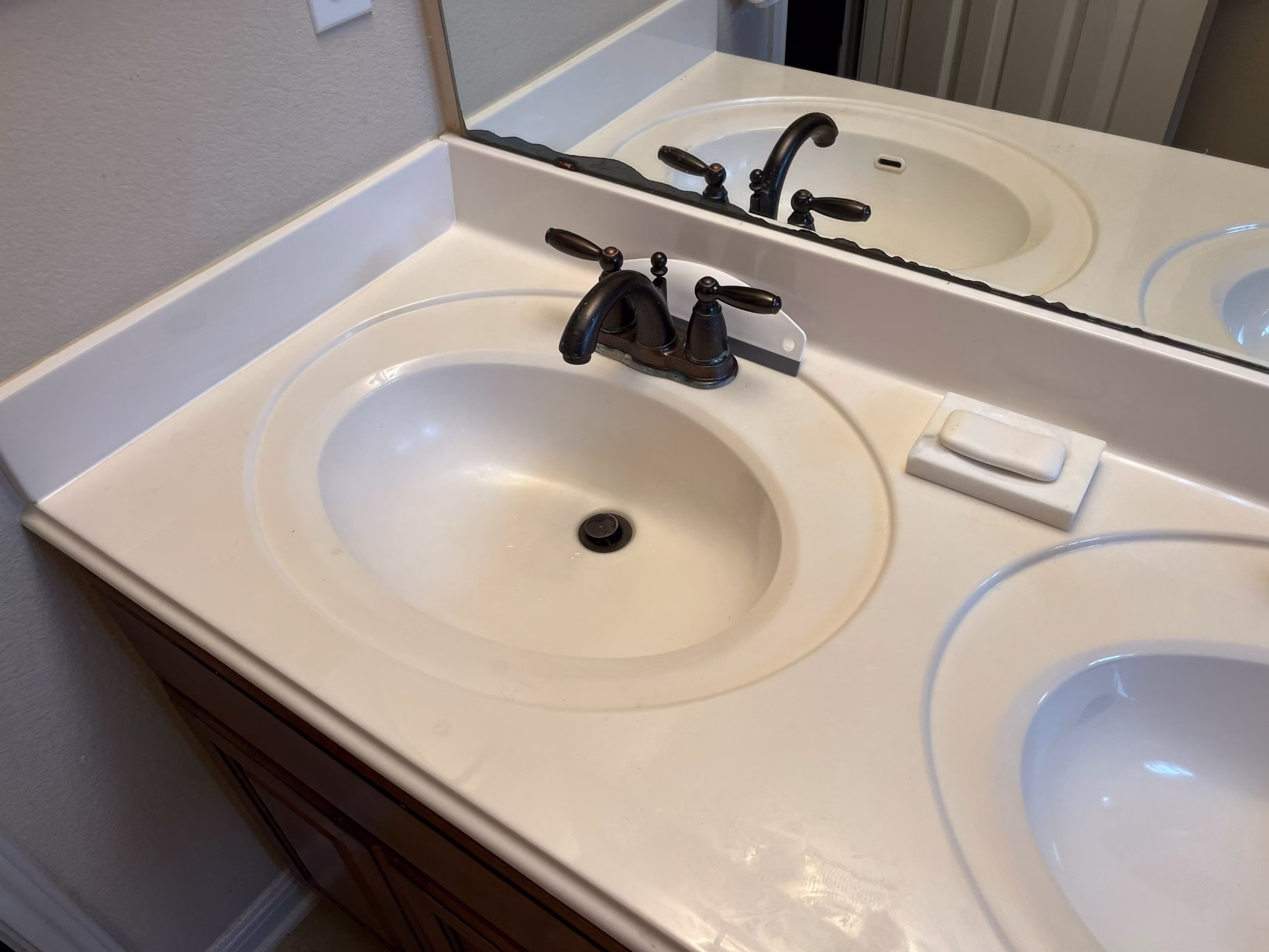 Bathroom cabinet repair and rebuild in progress after mold removal