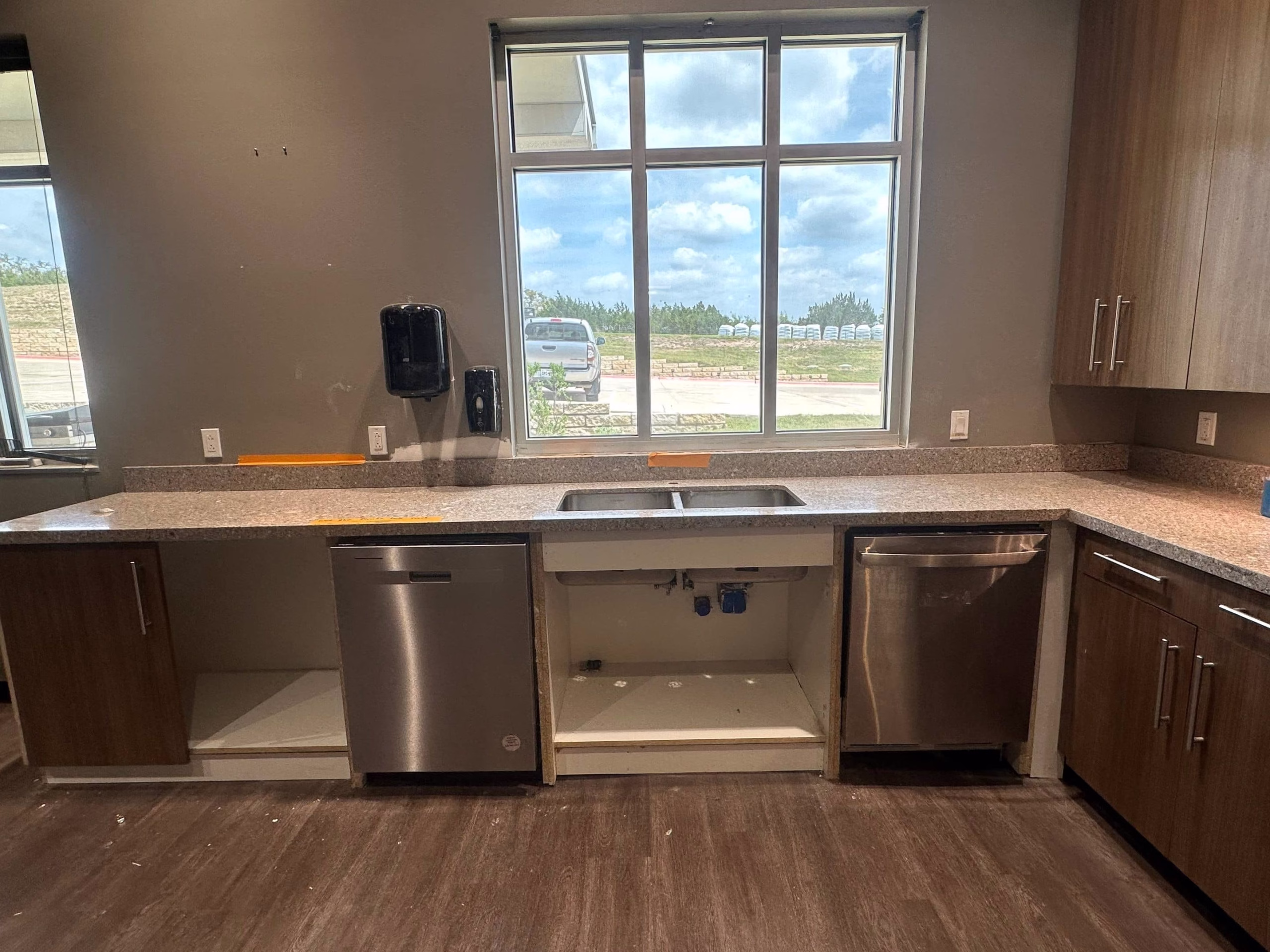 Wide-angle view of fully rebuilt kitchen after mold remediation and reconstruction completed