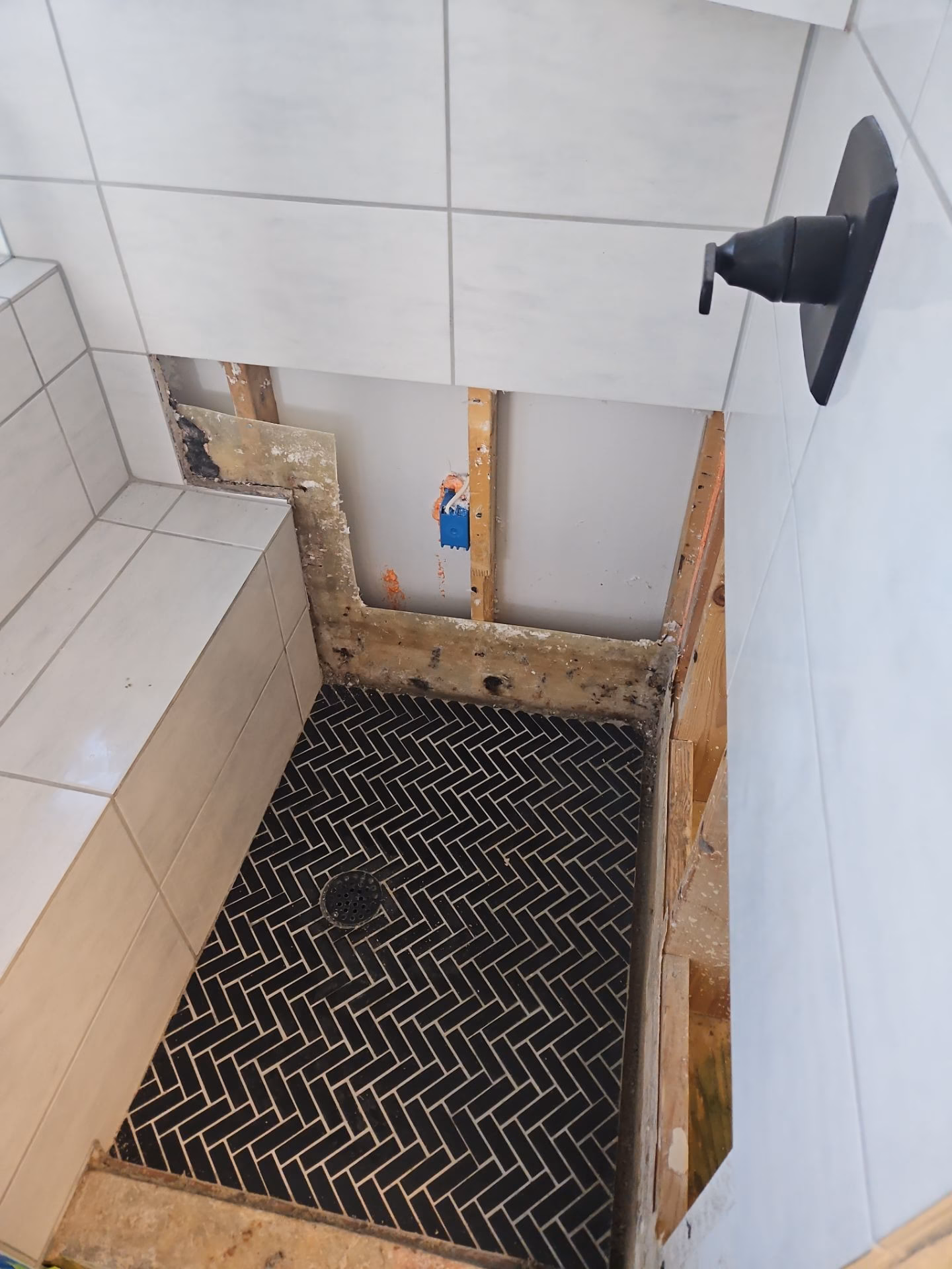 Bathroom water damage assessment and moisture mapping by Austin Fire and Flood restoration crew